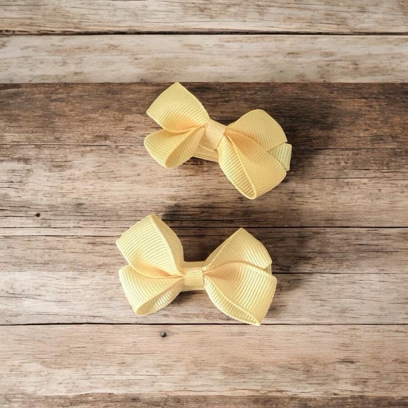 Baby Bow Clip 2 Pack -Yellows - Ages 6 Months Plus - Safety Hair Clip